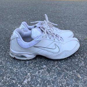 Women’s white Nike sneakers